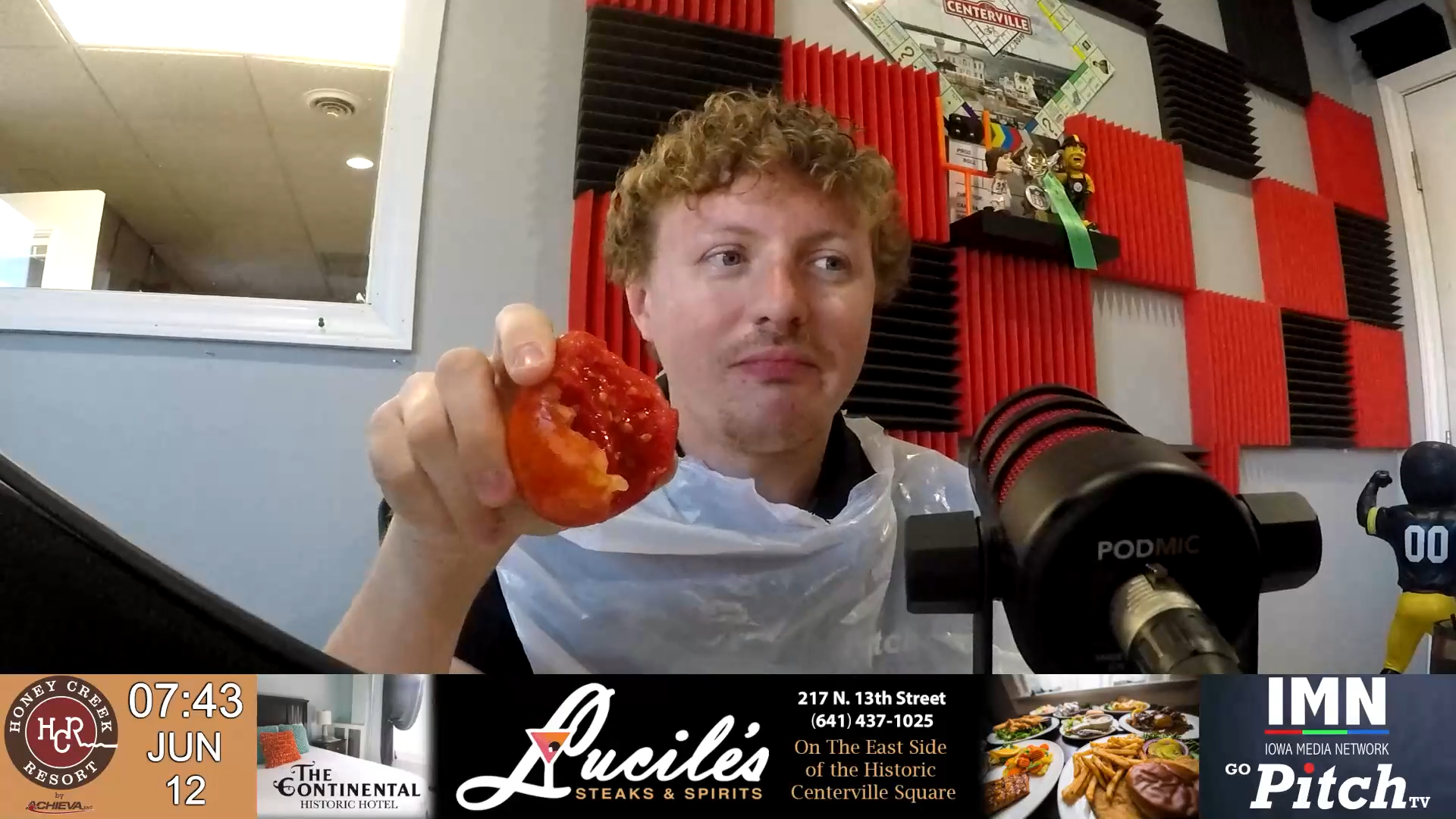 Ashley on Biceps and AJ eats a Tomato