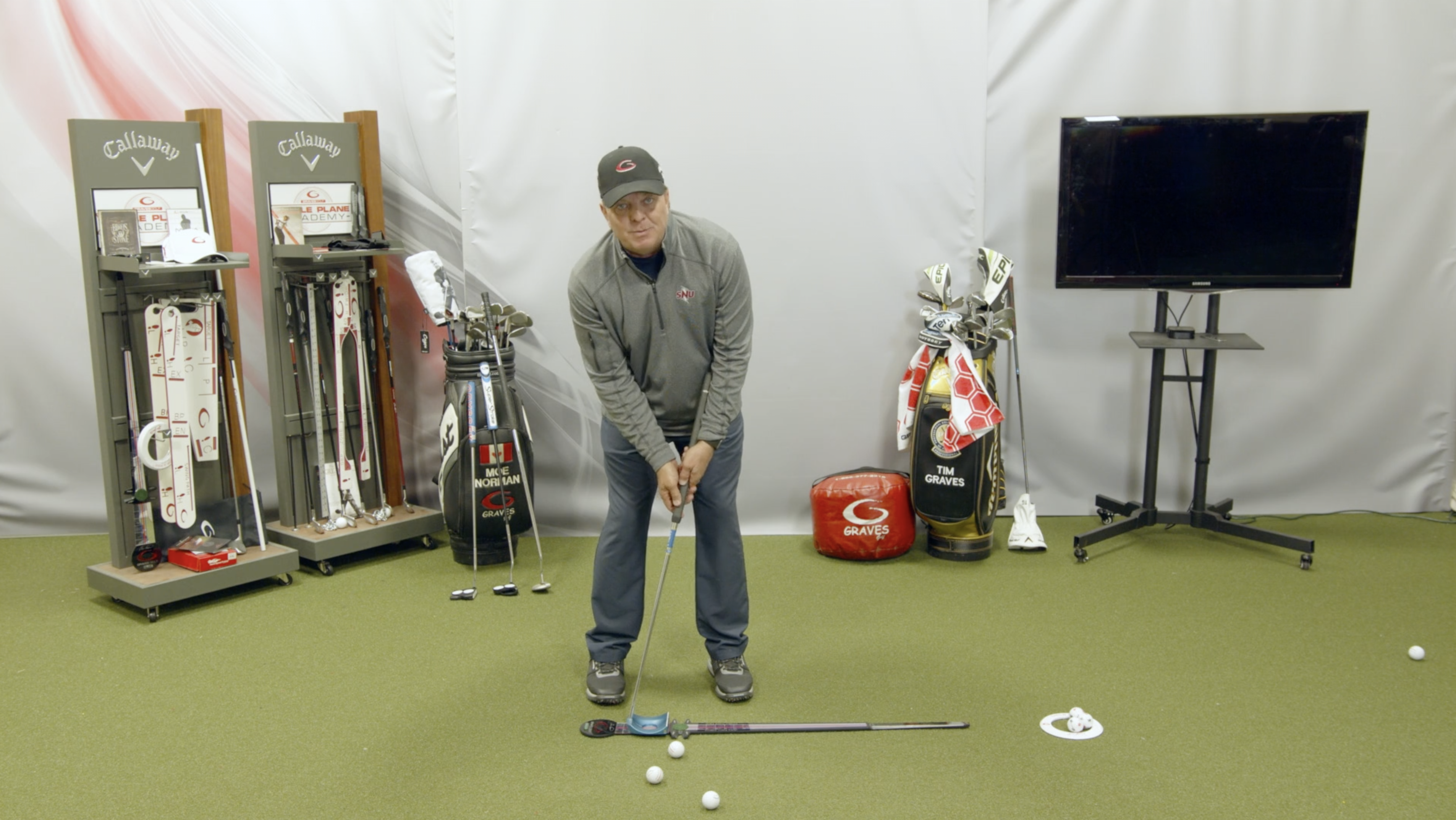 Practicing Putting on the Excalibur with Various Types of Putters