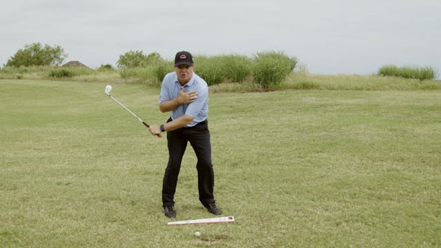 Shoulder-to-Chin Pitching Drill