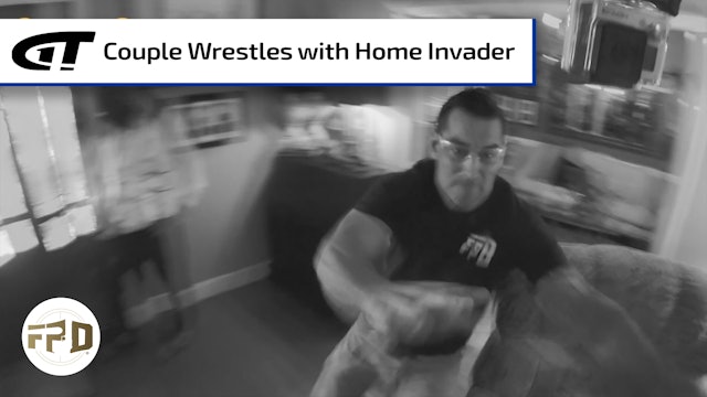 Couple Wrestles with Home Invader