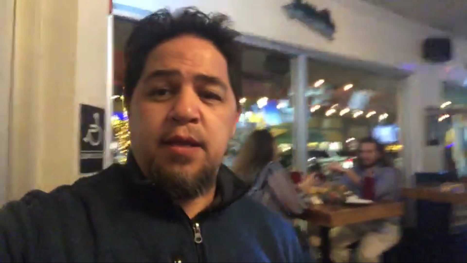 Mark Torres walks around checking out the action on Friday night