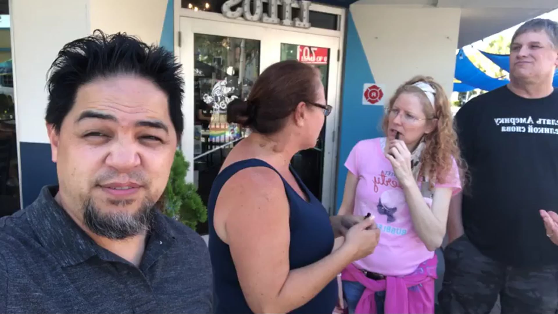 Mark Torres walks around checking out Lilo's venue