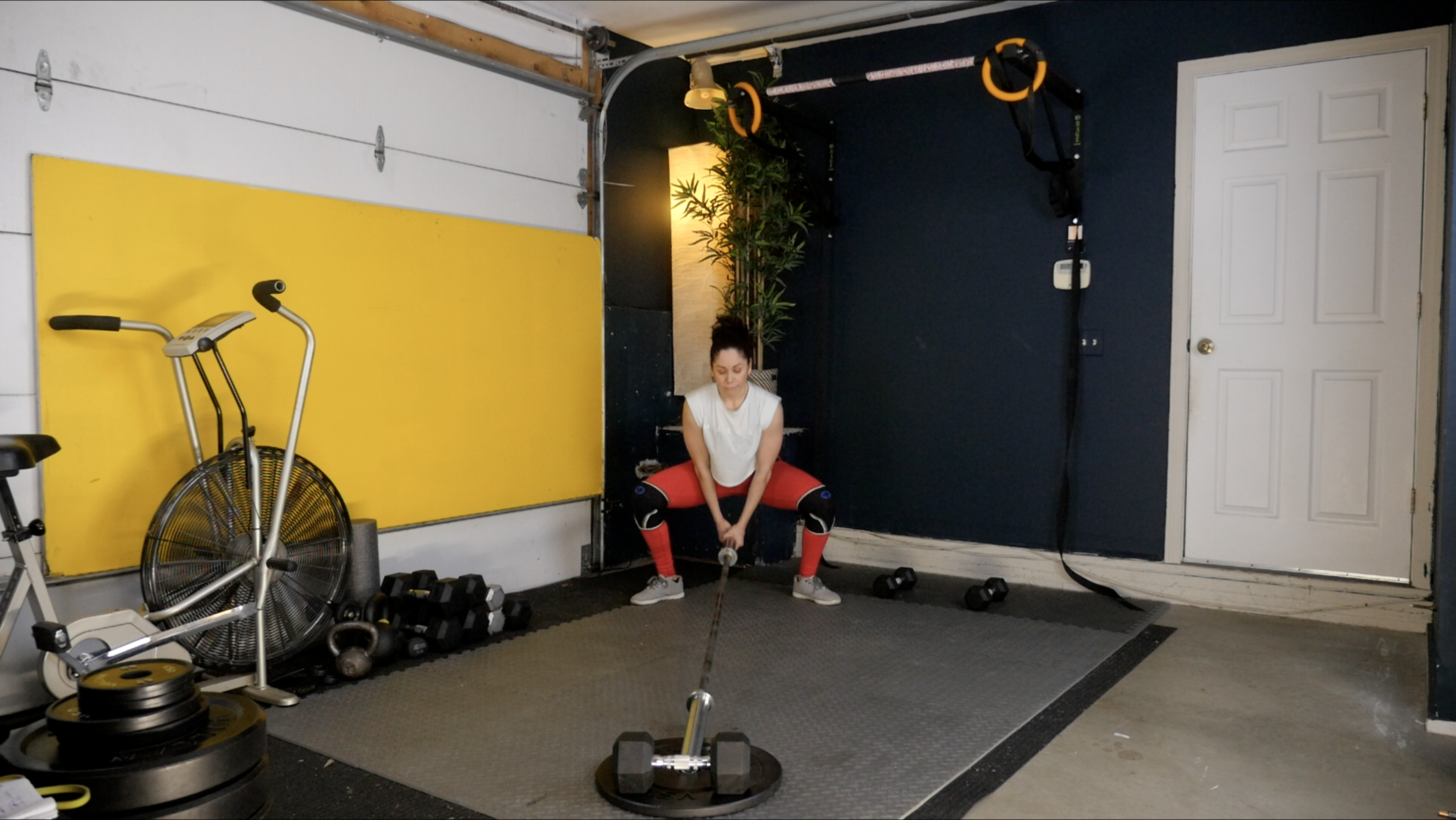 Week 4 Day 4 Exercise 1 Landmine Sumo Squats and Walking Lunges