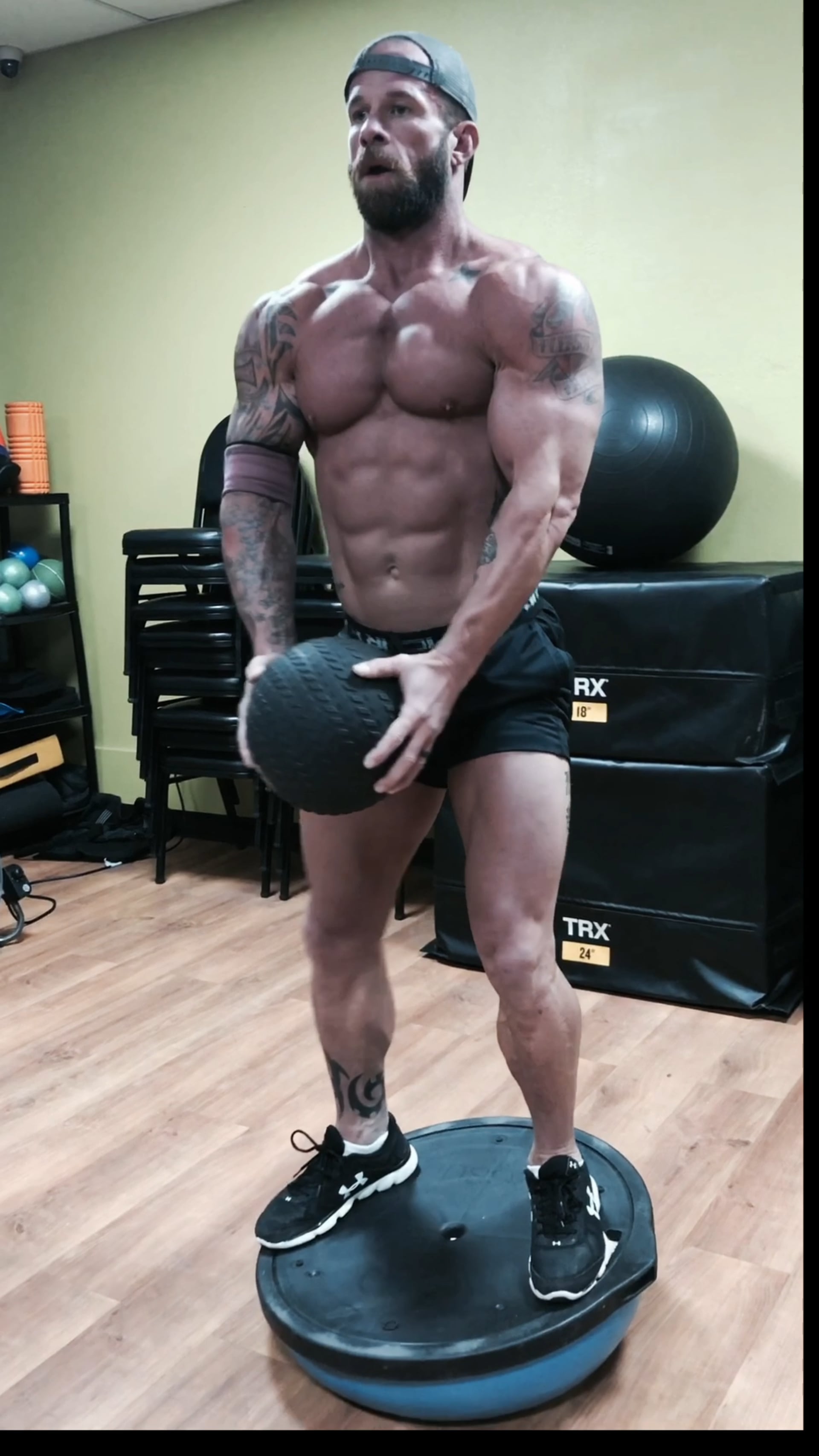 Shoulers Legs Glutes Abs- Balance ball squat raises