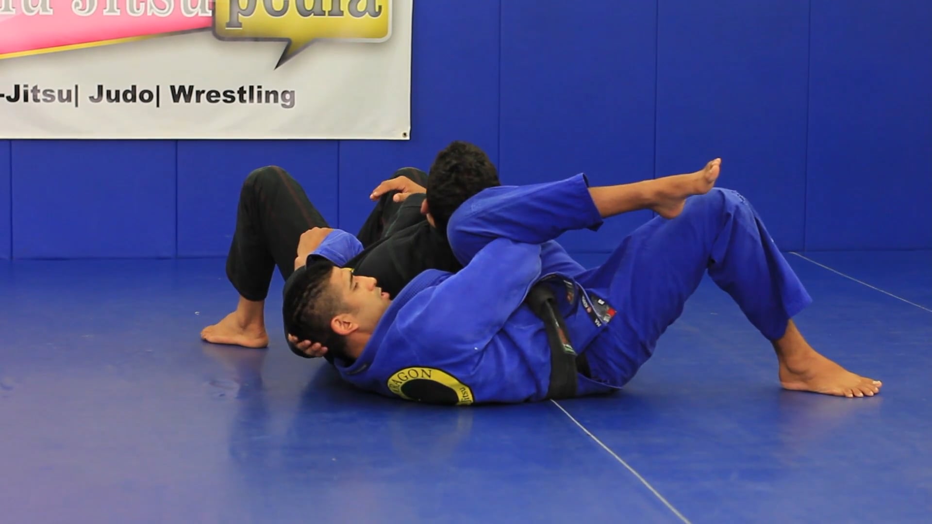 Clock choke fake to step over back strangle