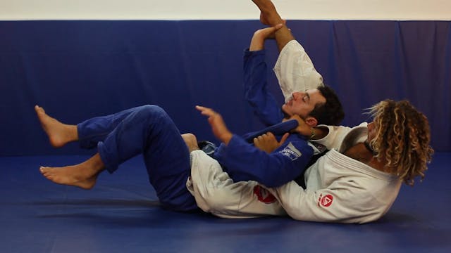 Arm drag to back magic choke