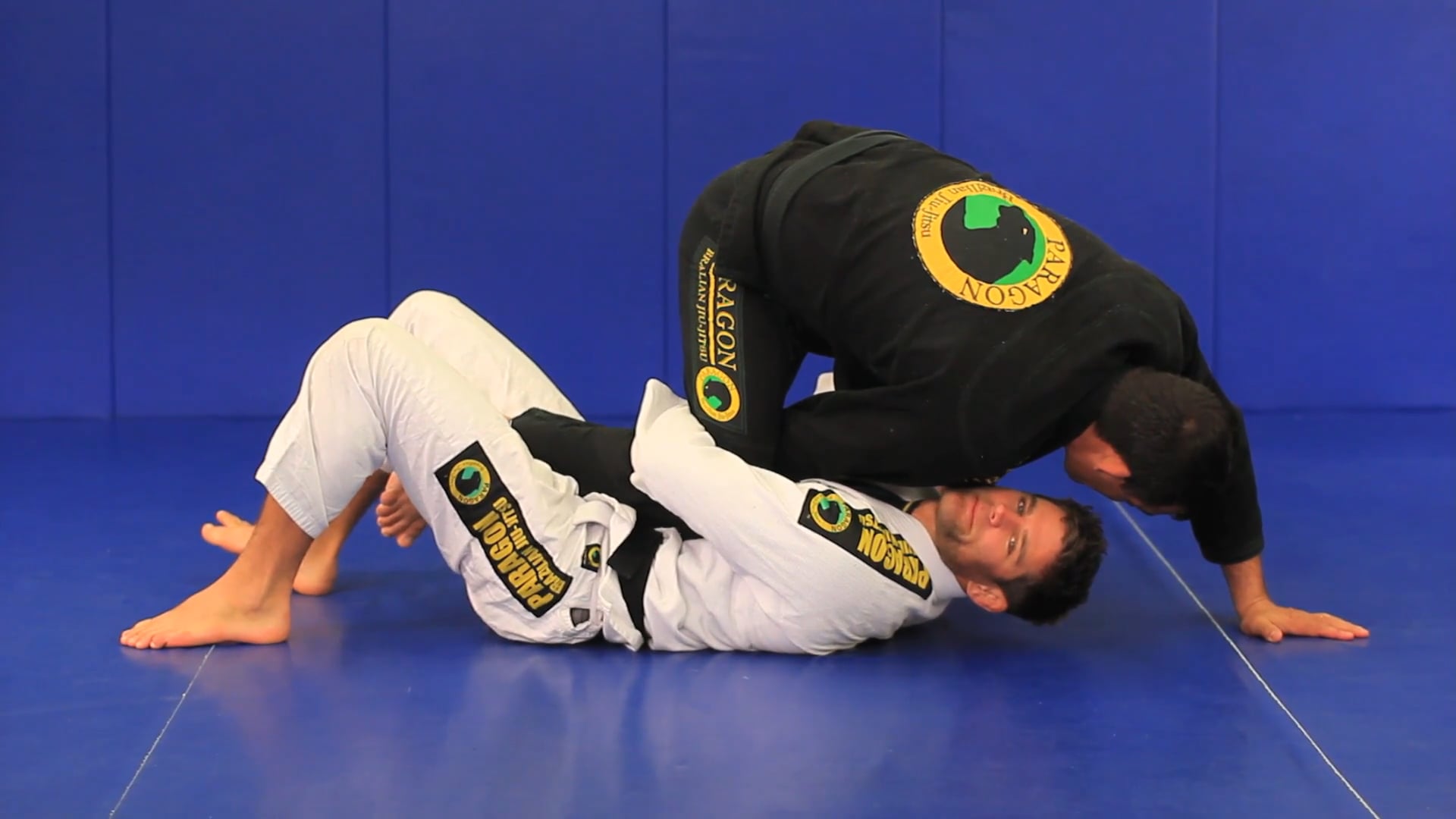 DLR ( De La Riva) trap near arm roll thru sweep