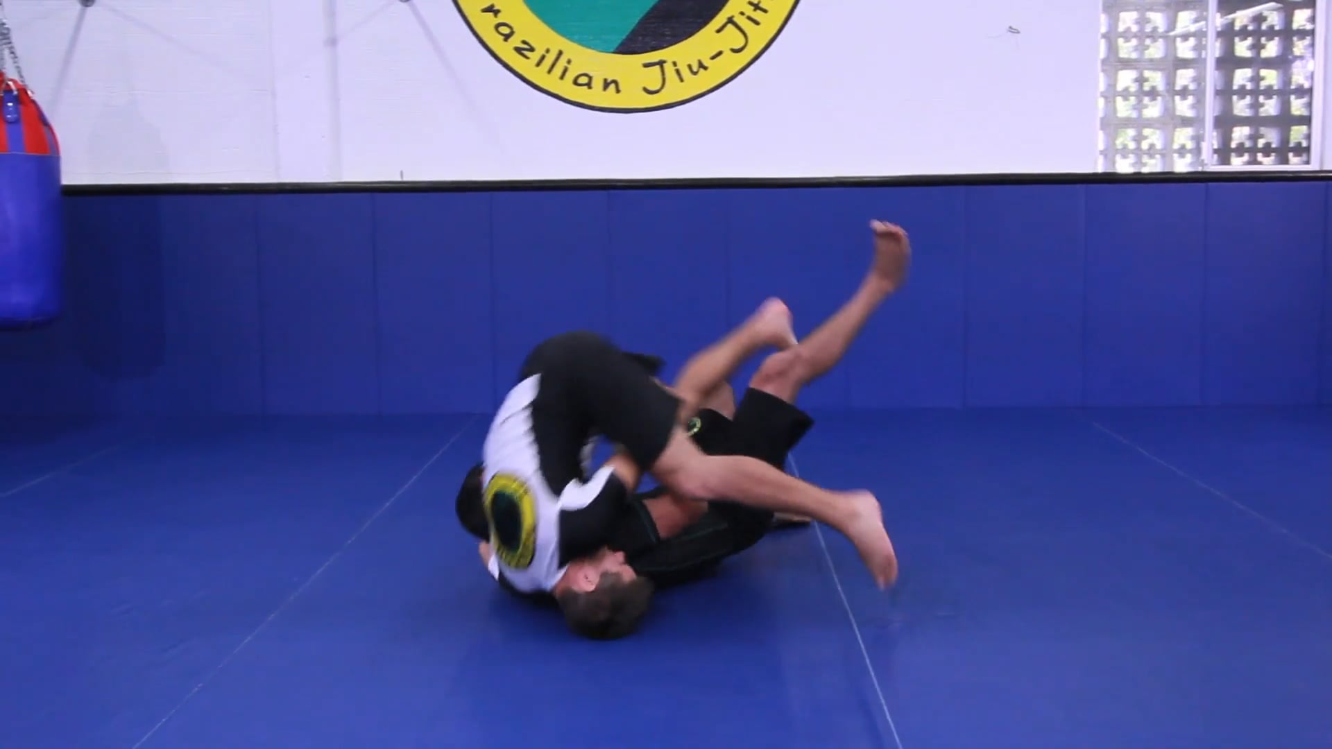 Guillotine defense dropping under opponent