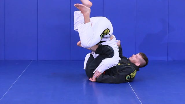 Over head sweep from butterfly guard