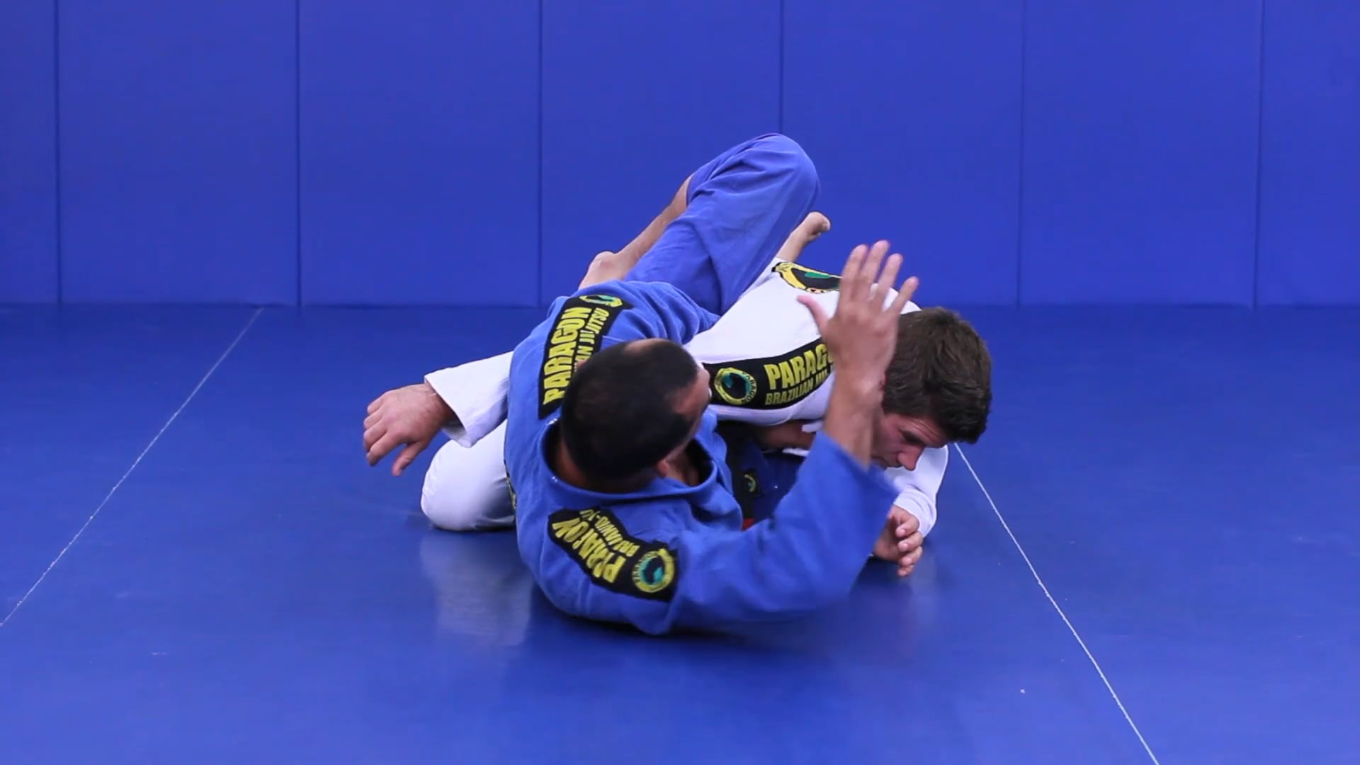 Choke with overhook control from closed guard