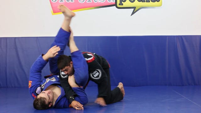 Seated guard sweep to triangle submission