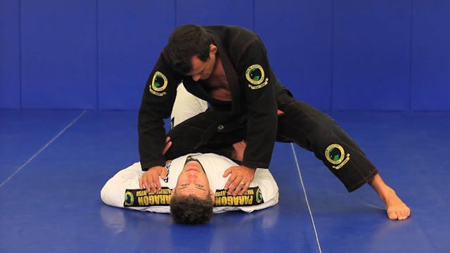 Knee belly escape to half guard