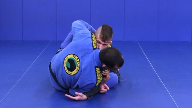 Arm drag to hook sweep from guard