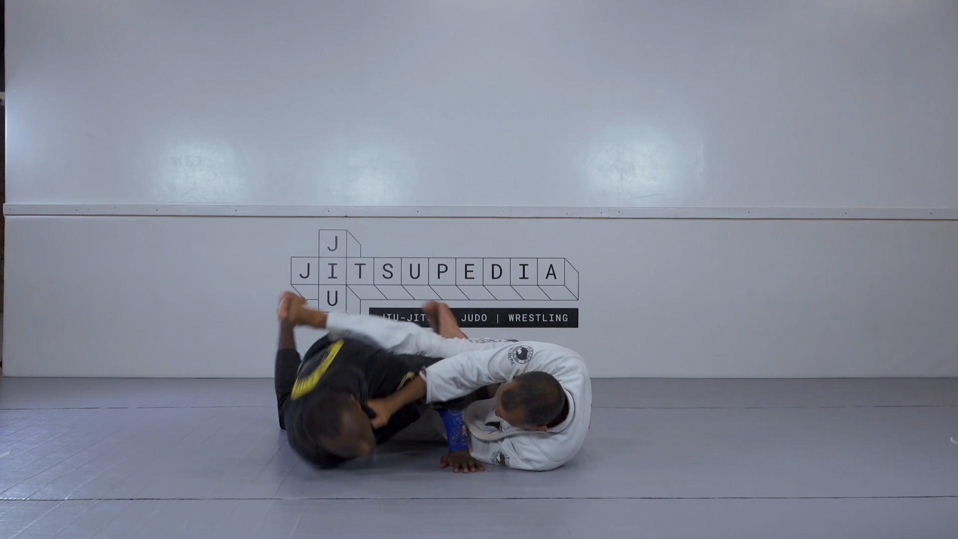 Axe sweep from half spider guard