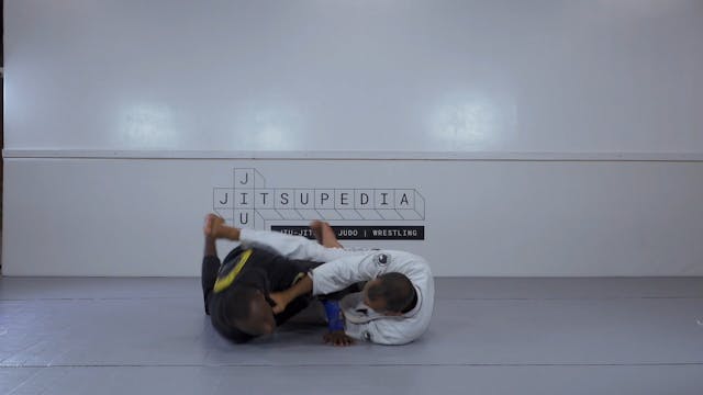 Axe sweep from half spider guard