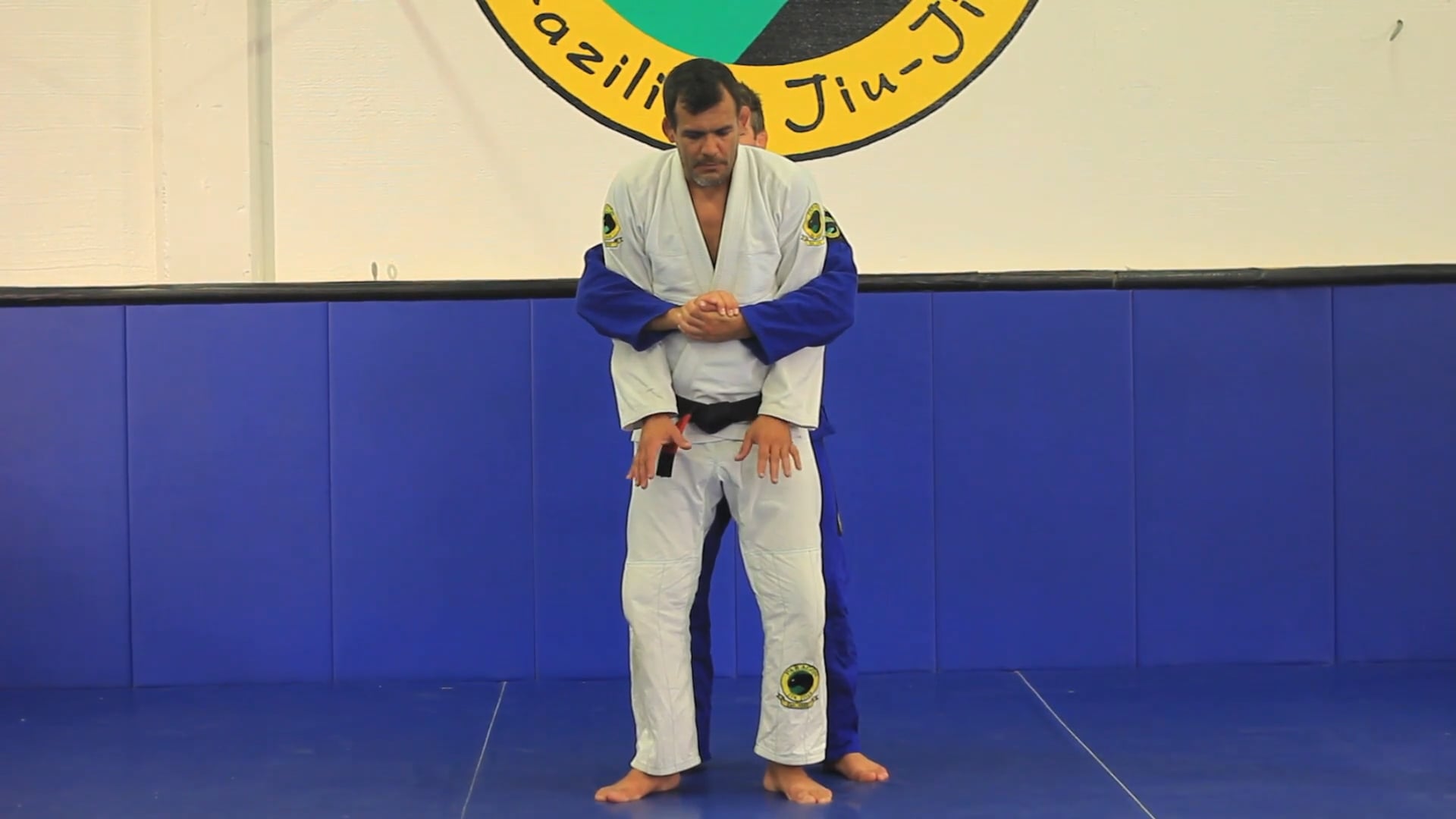 Self defense (over arm bear hug from behind)