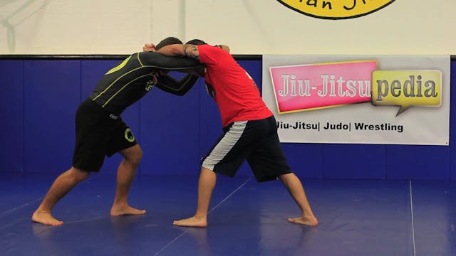 Collar tie slide by wrestling takedown