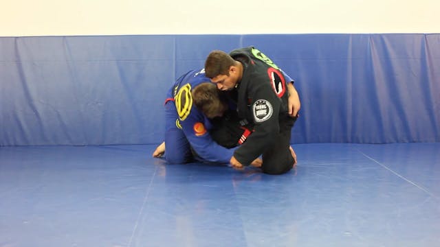 Half guard roll under sweep