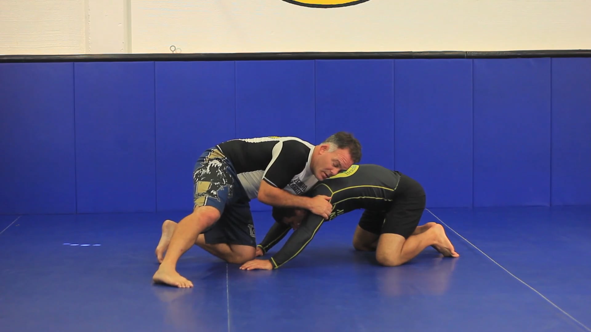 The chop from the front headlock in wrestling