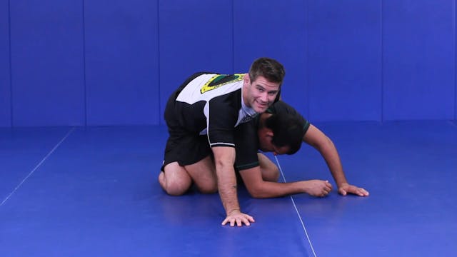 Arm drag back take from guard