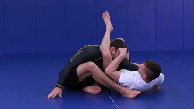 Rolling omoplata to triangle combination