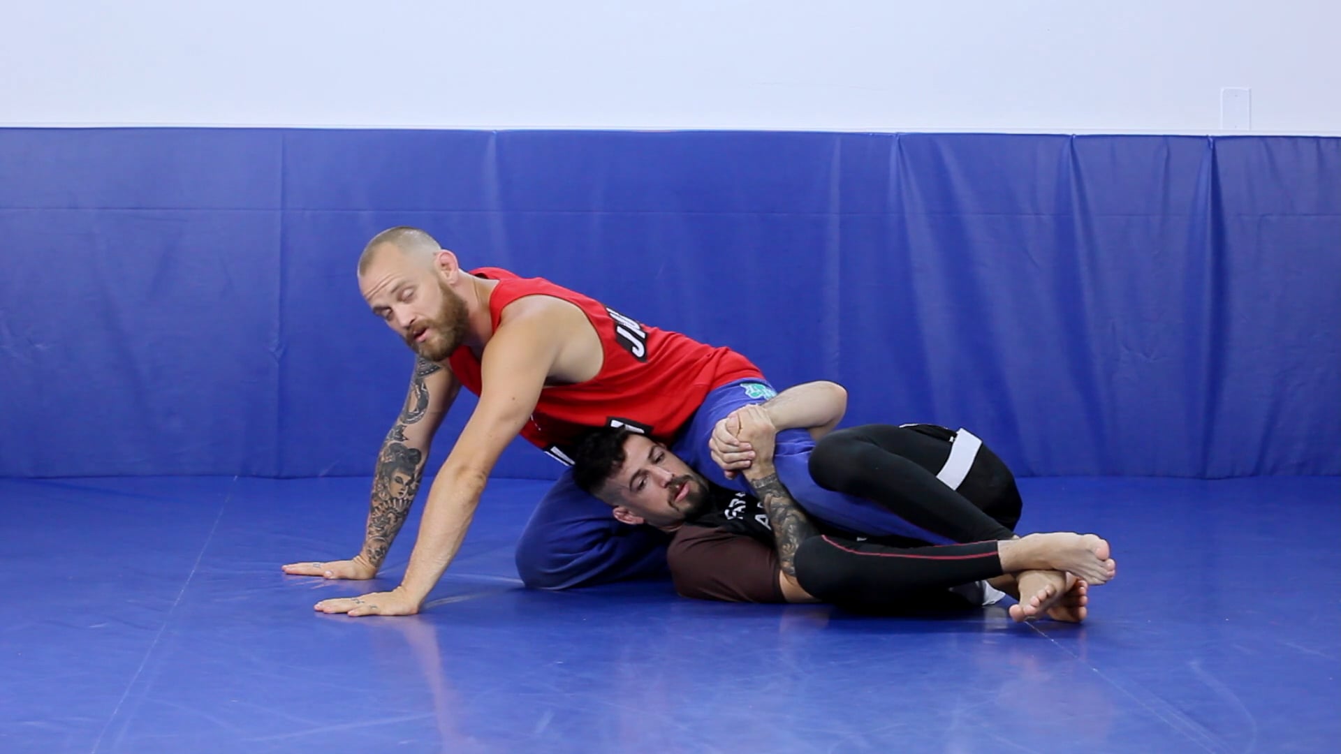 Coming out the back door in the deep half guard