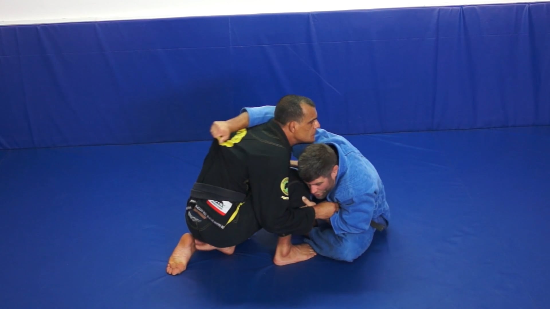 Seated guard (over the back forward sweep)