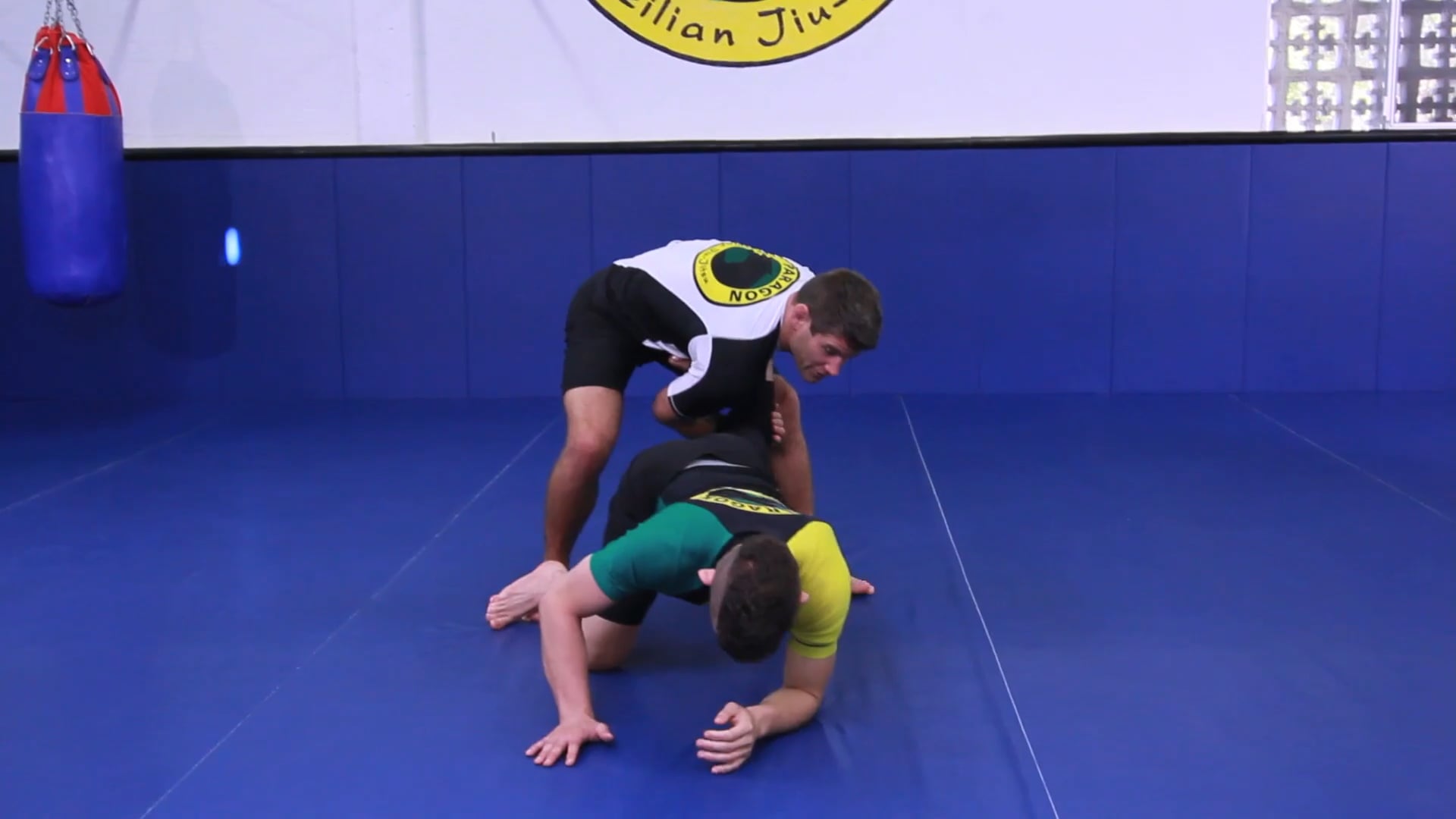 Shoulder roll finish to single leg takedown