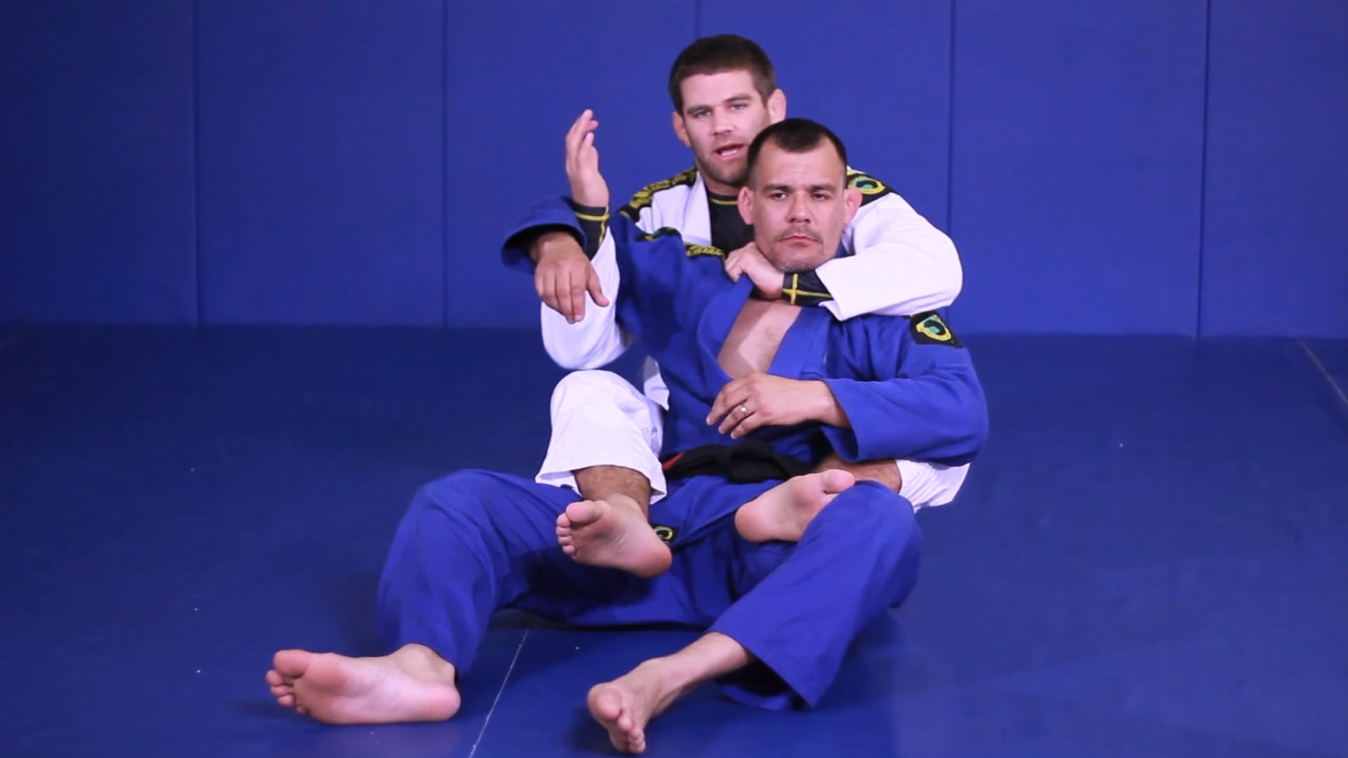 Lapel choke arm behind the head from back control