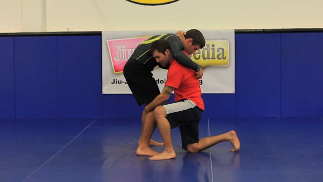 Collar tie to throw wrestling takedown