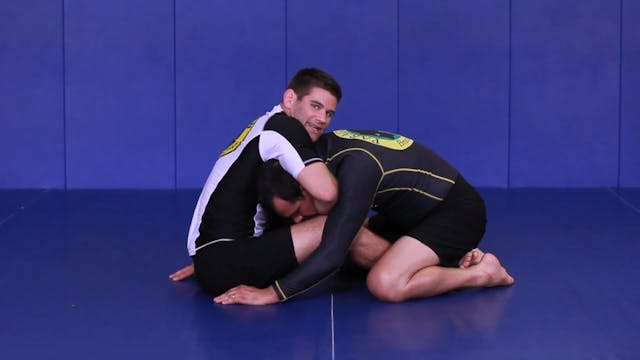 Guillotine to hook sweep from butterfly