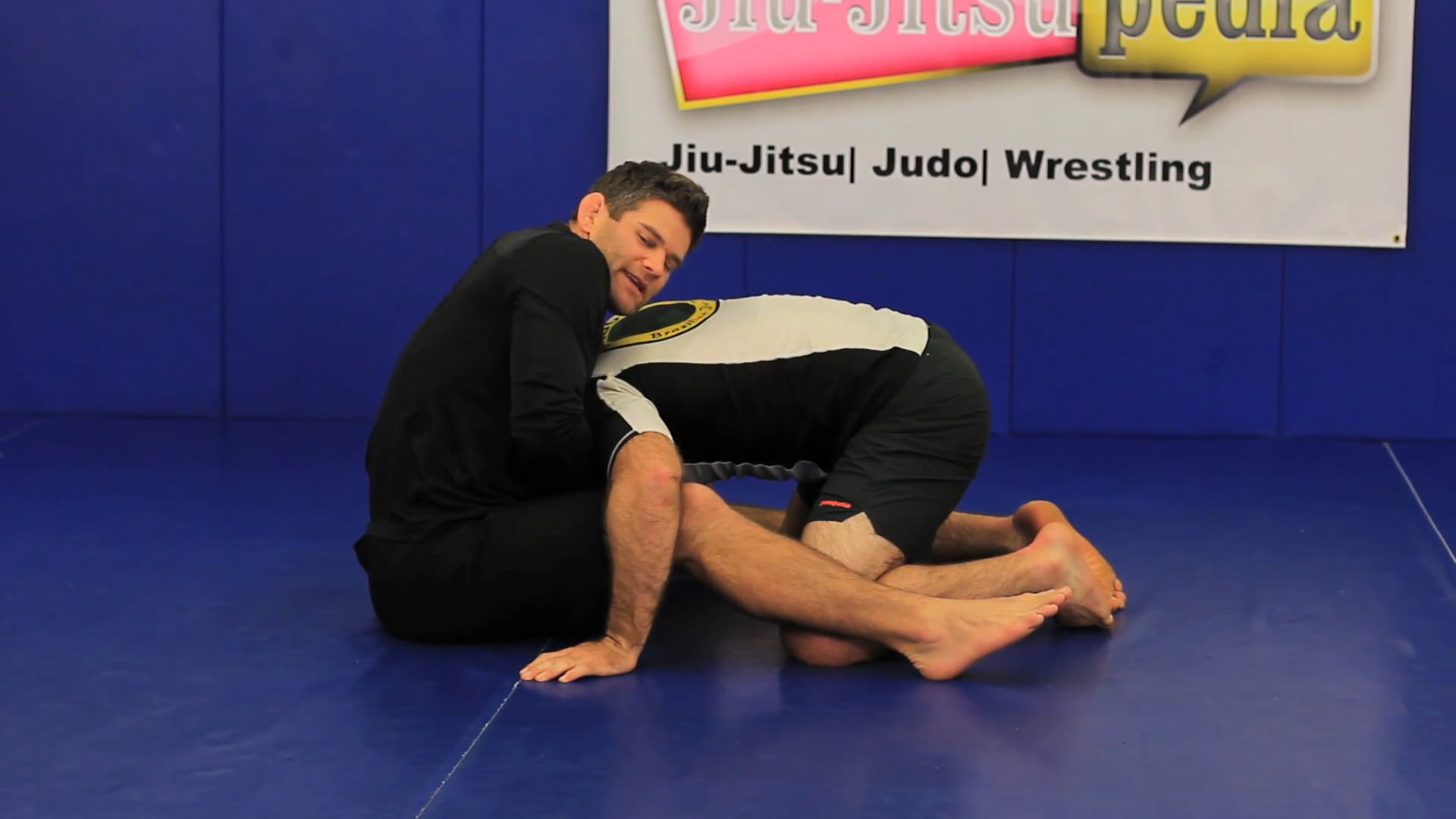 Guillotine from the closed guard in BJJ