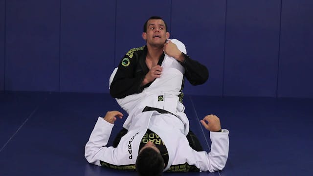 Triangle defense from closed guard