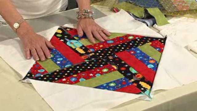 Strip Pieced Diamond Quilt with Valer...