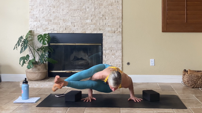 Flow towards Astavakrasana (Eight-Angle Pose)