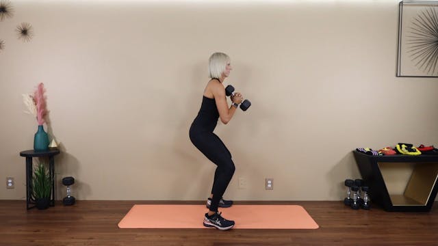 Squat with Single Dumbbell Chest Push...