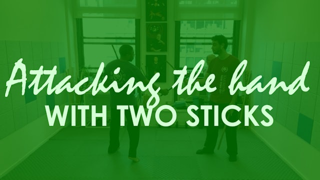 ATTACKING THE HANDS WITH TWO STICKS
