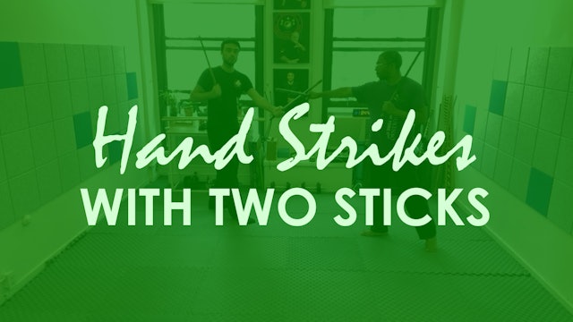 HAND STRIKES WITH TWO STICKS
