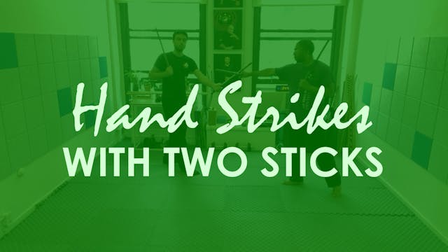 HAND STRIKES WITH TWO STICKS