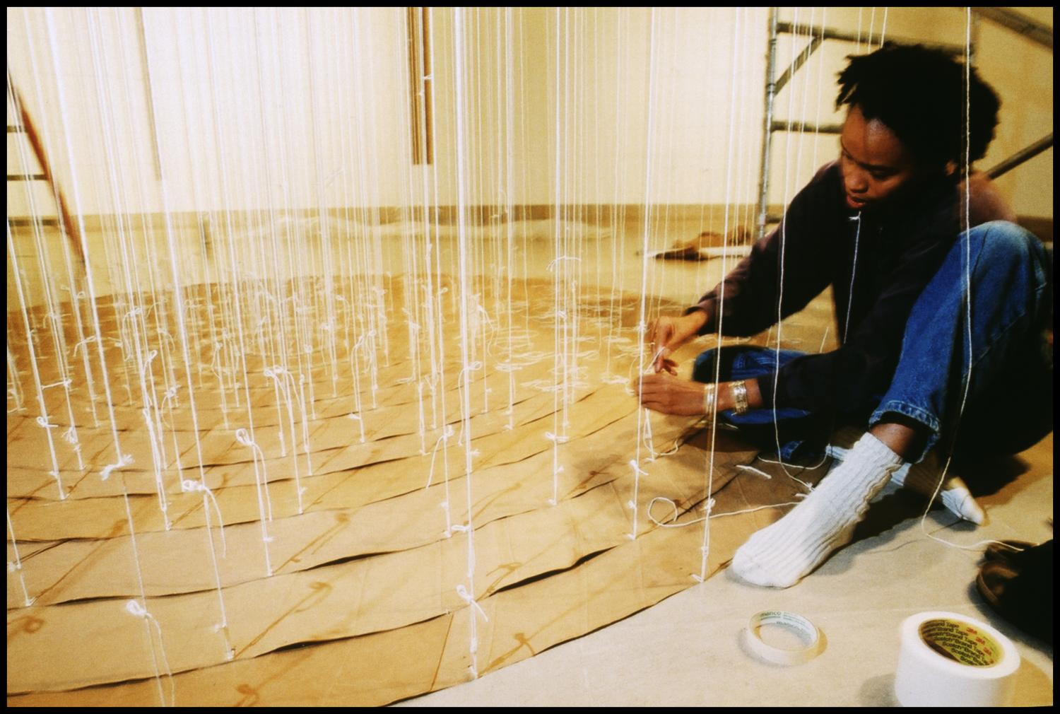 Annette Installing Exhibition