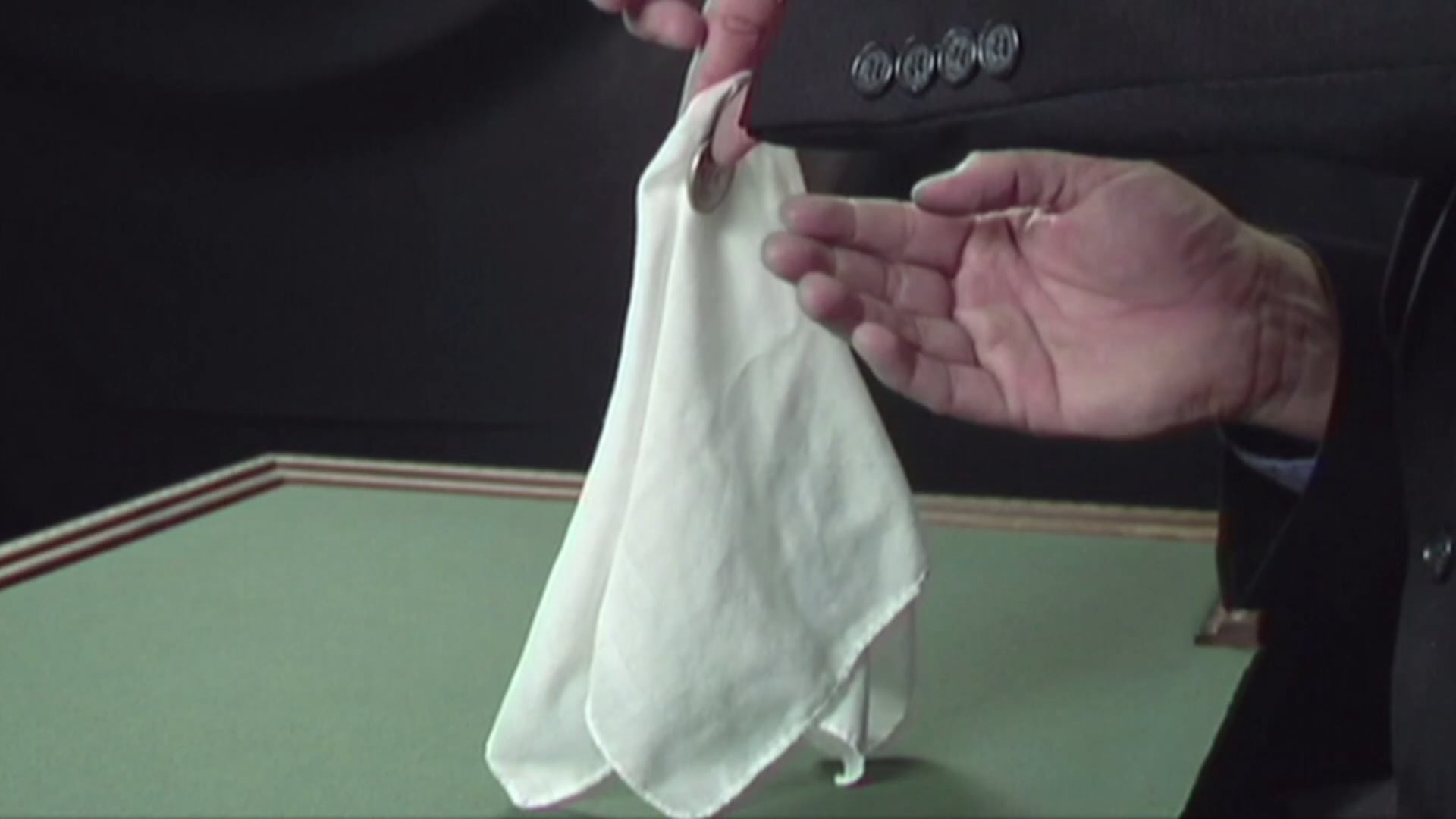 Perfected Coin Through Handkerchief 