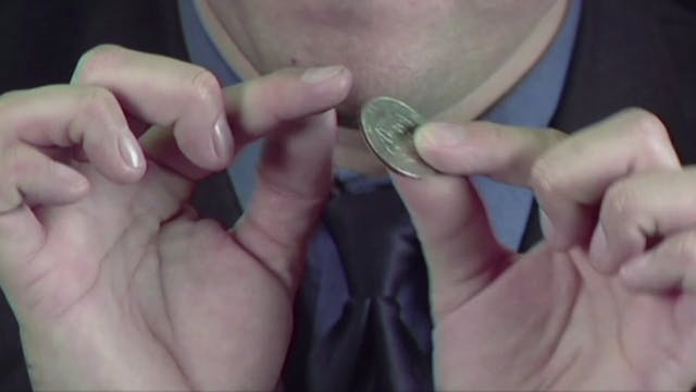 Biting a Piece From a Coin 