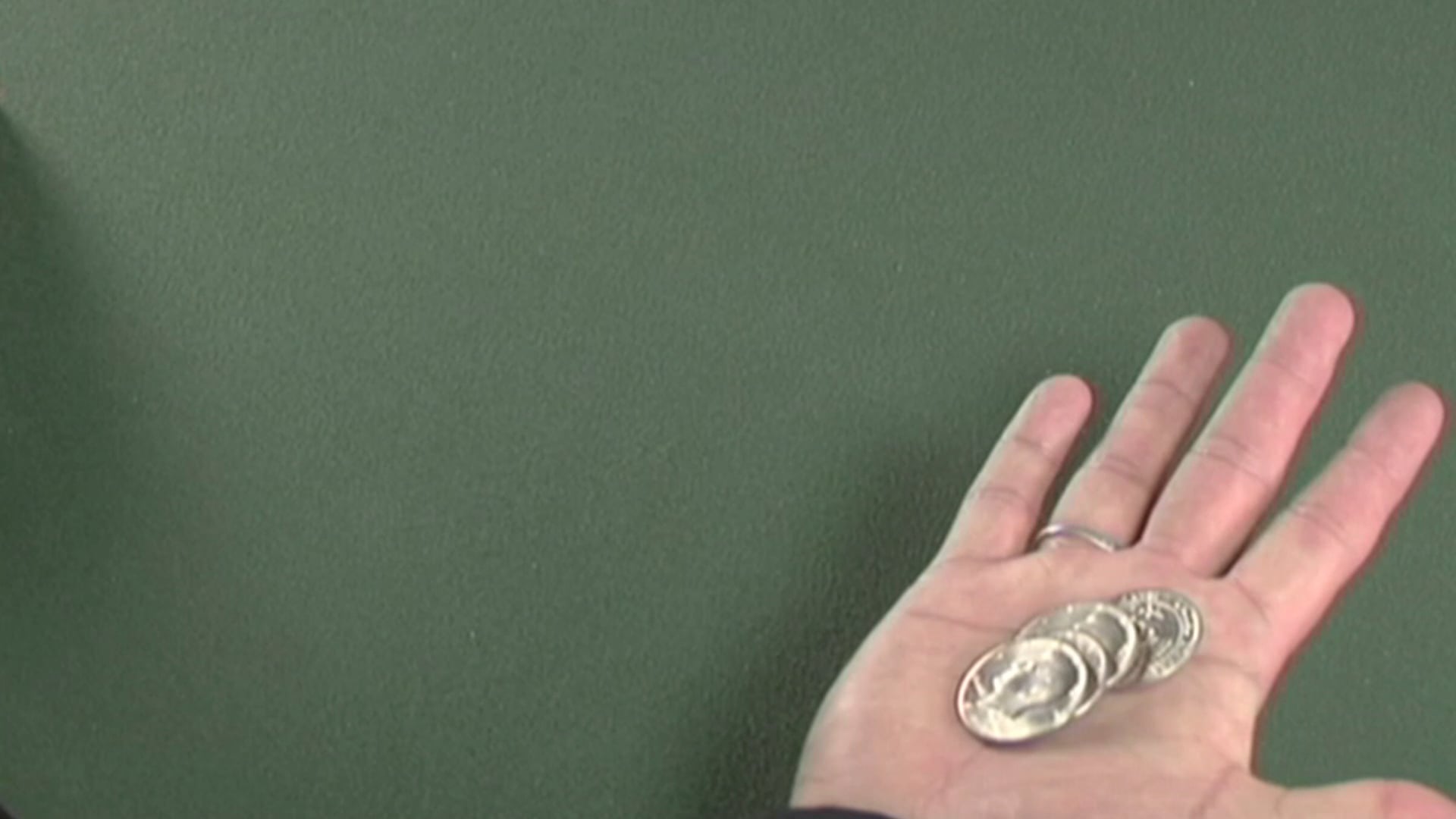 A Method of Sleeving One of Several Coins 