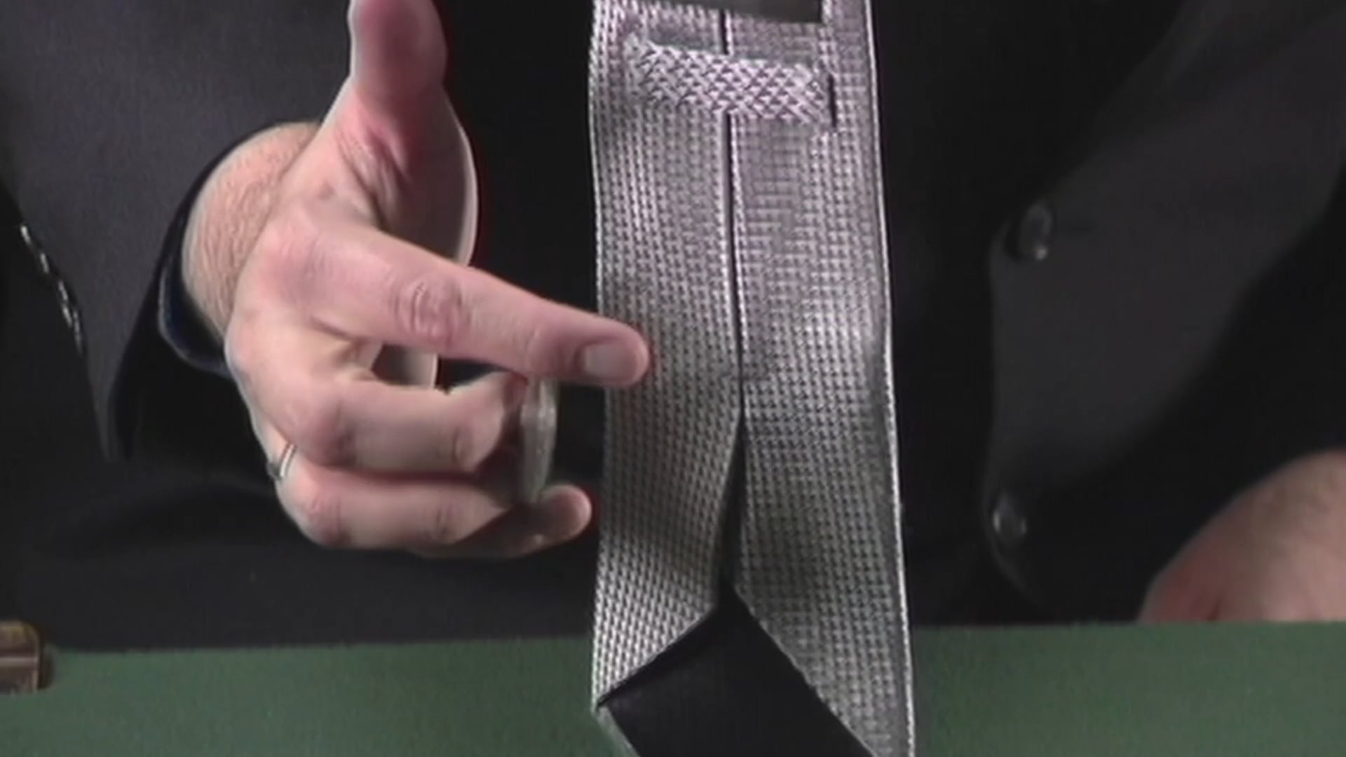 Producing a Coin from a Spectators Pocket 