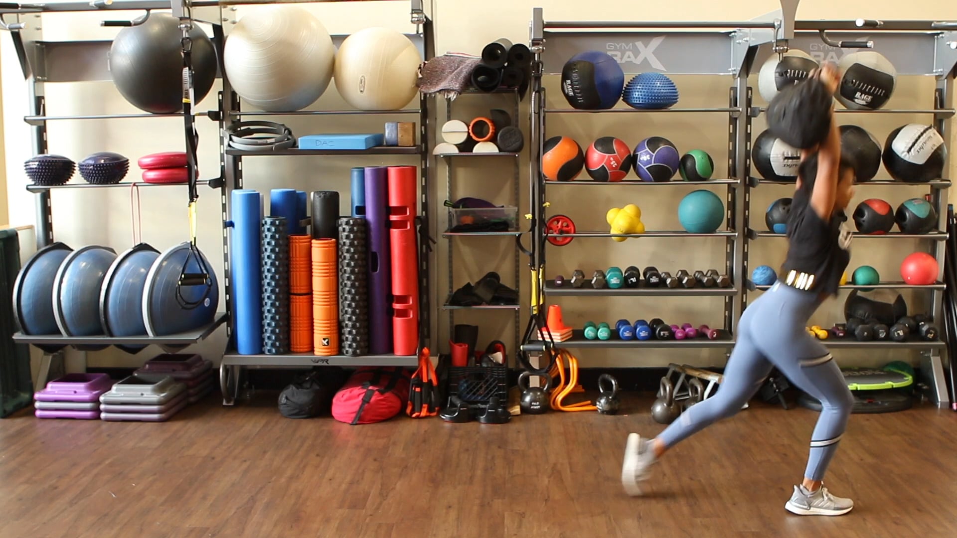 Sandbag Overhead Walking Lunge