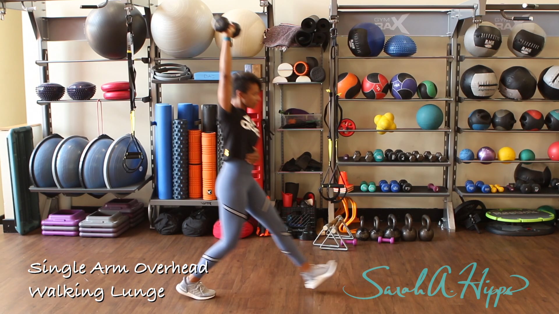 Single Arm Overhead Walking Lunge
