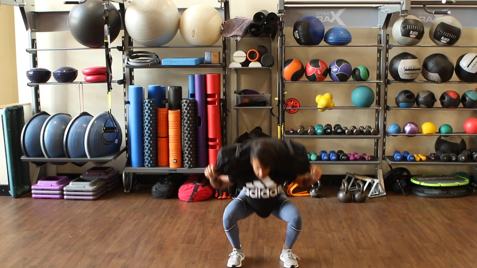 Sandbag Back Squat Hop