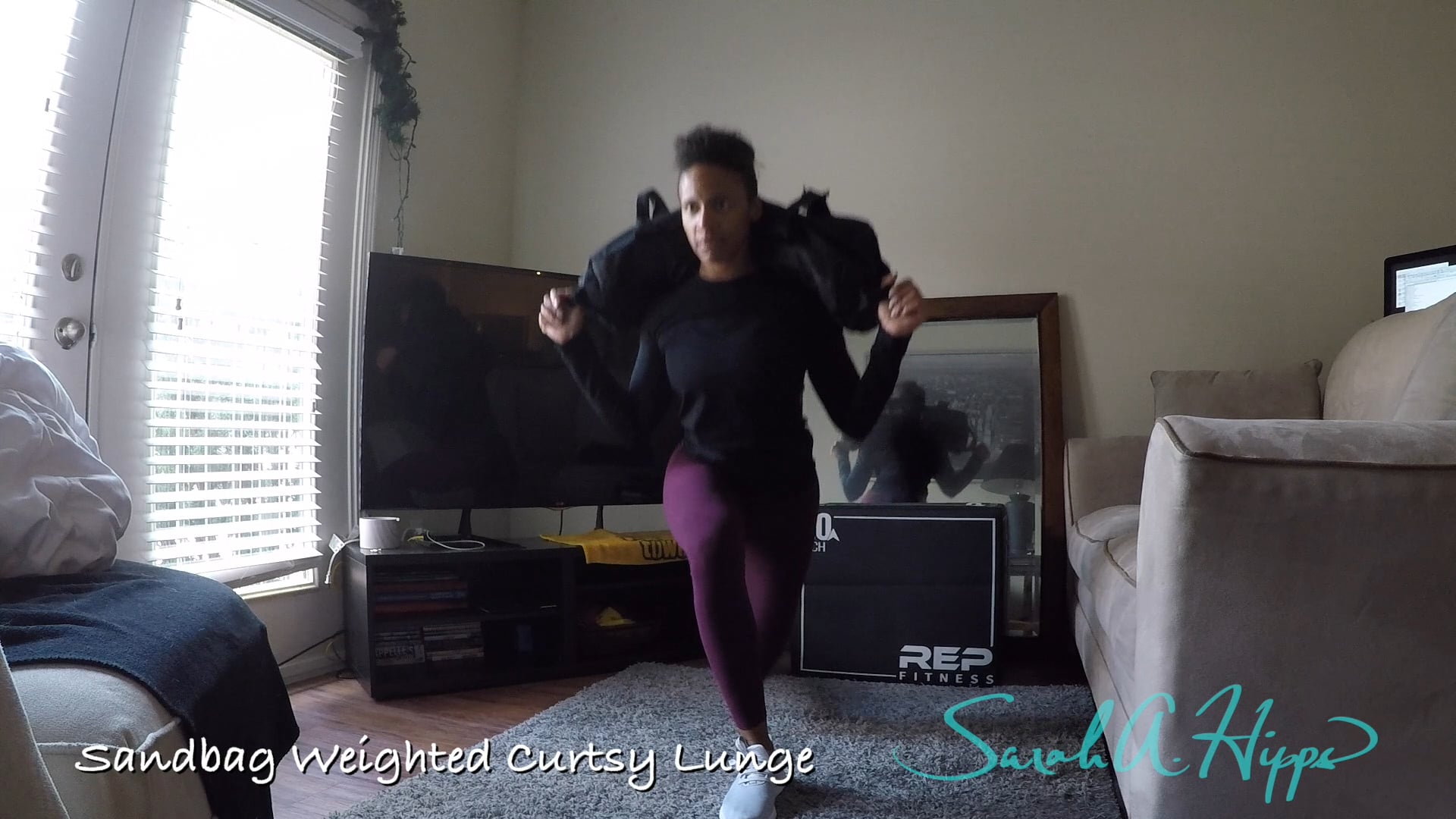 Sandbag Weighted Curtsy Lunge