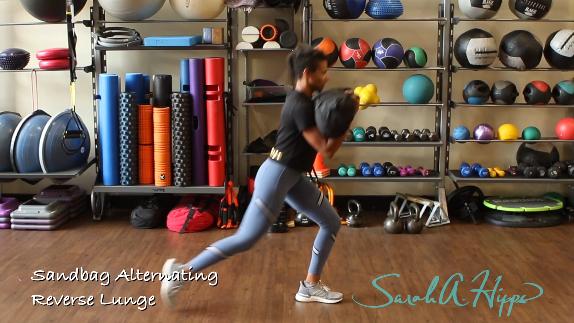 Sandbag Alternating Reverse Lunge