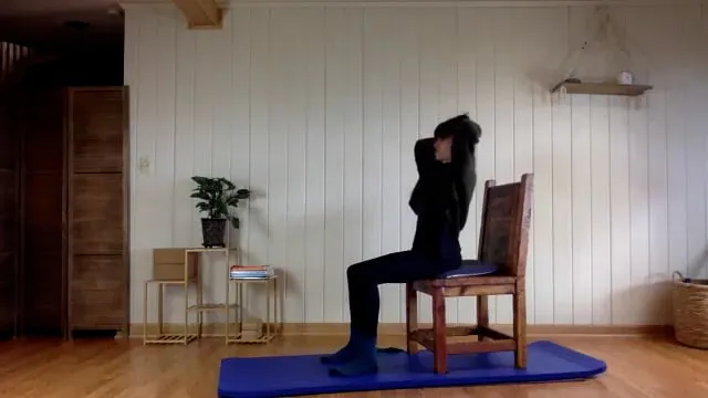 Pilates class with chair and Theraband